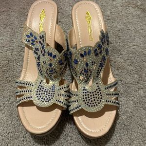 Beautiful silver and blue gems on these sandals